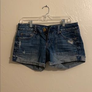 Distressed denim shorts